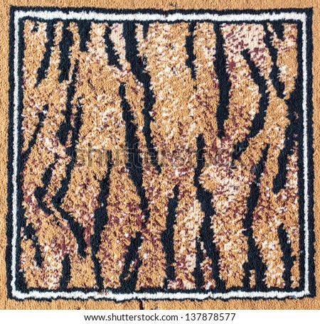 Black and brown tiger pattern rug texture surface