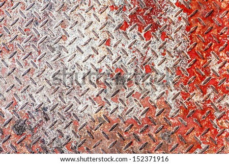 Red and white diamond pattern metal sheet surface seamless texture background