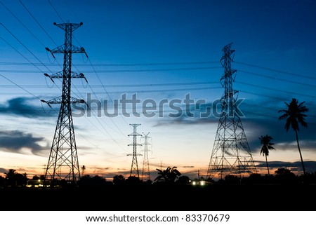 Electricity poles in twilight time in rural place