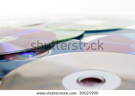 Close up of dvd discs as background, rainbow reflection