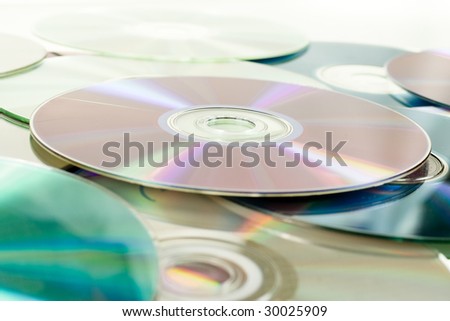 Close up of dvd discs as background, rainbow reflection