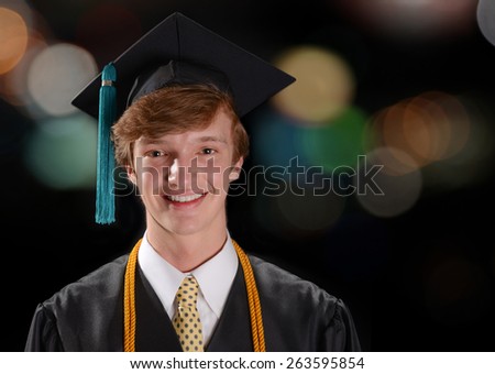 Student Graduating wearing cap and gown