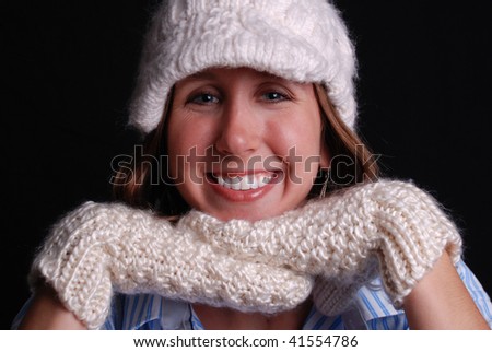 Cute Girl with Mittens and Hat