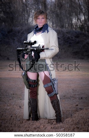 Military Woman with Guns in a Duster