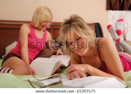 Two Young Women Studying