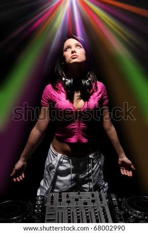 Beautiful DJ Girl with Club Lights Shining Down on her