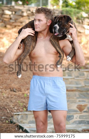 Handsome Man in Boxer Shorts with Boxer Dog