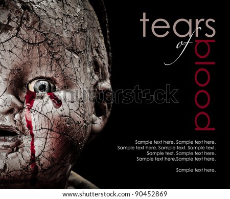 Close up Horror photo of a Cracked Scary Doll Crying Blood with text space to the right