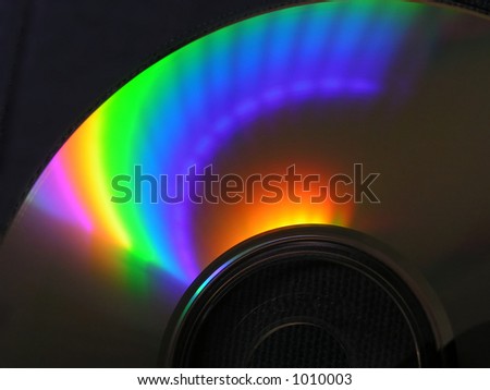 Full light spectrum on a cd quarter, black background