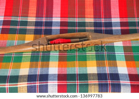 Wooden bobbin for traditional clothes weaving