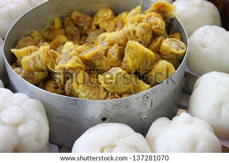 Chinese snacks, rice or wheat dough enclosing minced meat and steamed, Chinese bun