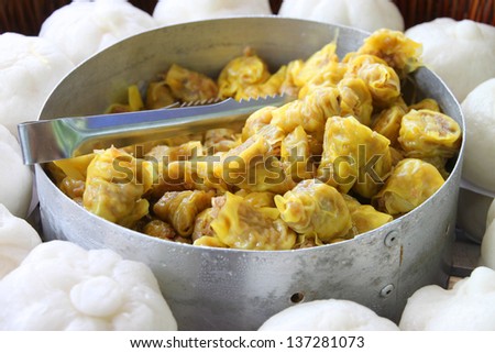 Chinese snacks, rice or wheat dough enclosing minced meat and steamed, Chinese bun