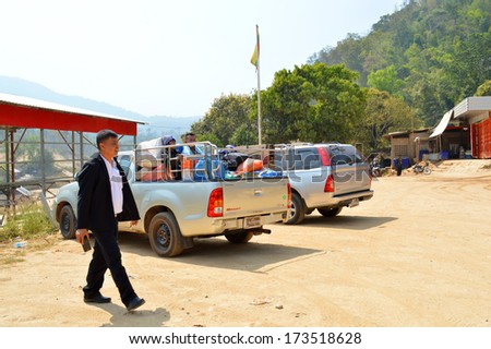 PHU NAM RON BARRIER, MYANMAR - JANUARY 23 : Unidentified man is traveling to temporary Myanmar immigration border crossing on January 23, 2014 in Phu Nam Ron barrier, Myanmar.