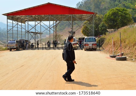 PHU NAM RON BARRIER, MYANMAR - JANUARY 23 : People visit temporary Myanmar immigration border crossing on January 23, 2014 in Phu Nam Ron barrier, Myanmar.
