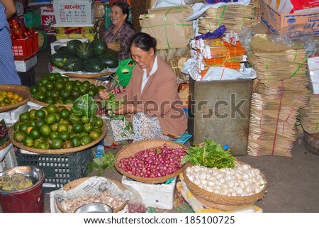 HUE, VIETNAM - MARCH 15 : Merchants are selling foods and fruits at Dong Ba market on March 15, 2014 in Hue, Vietnam. Dong Ba is the biggest market in Hue, Vietnam.
