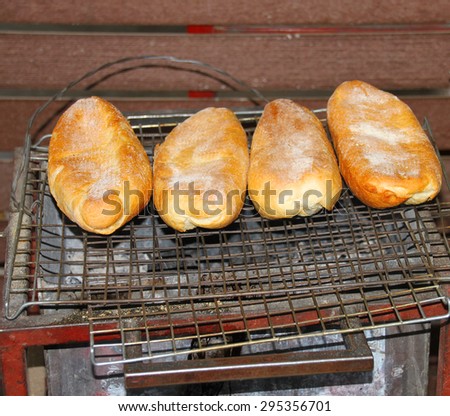 grilled French loaf or baguette on stove