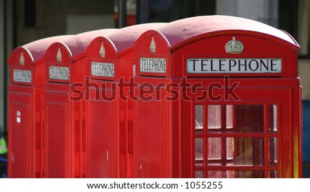 Four red London telephone boxes