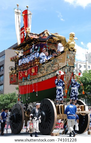 KYOTO, JAPAN - JULY 17: Gion matsuri is traditional most famous festival on July 17, 2010 in Kyoto, Japan. This festival has a history of 1,000 years, and the man move the float by only human power.