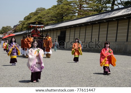 KYOTO, JAPAN - MAY 15: Unidentified performers of Aoi Matsuri (Hollyhock festival) walk to pray for an abundant harvest on May 15, 2011 in Kyoto, Japan. This festival was started in 6th century.