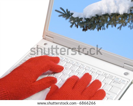 Winter is coming, red gloves and laptop