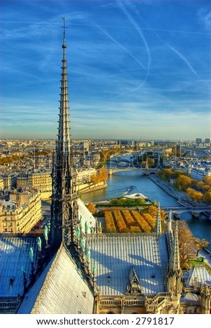 stock photo Steeple of Notre Dame and the city of Paris HDR image