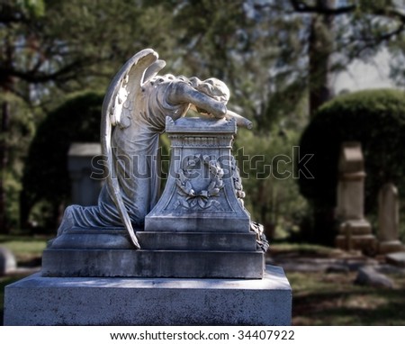 stock photo Crying angel statue in Glenwood Cemetery in Houston TX
