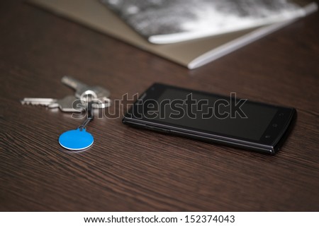 Smart phone and NFC tag on the table, NFC (Near Field Communication) theme