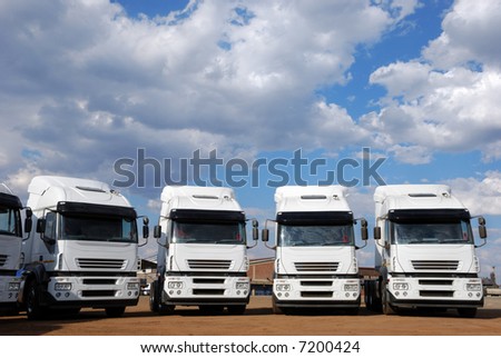 Cargo Trucks Parked in a Row with Copy Space