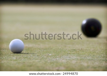 Lawn Bowls with narrow focus on the white ball
