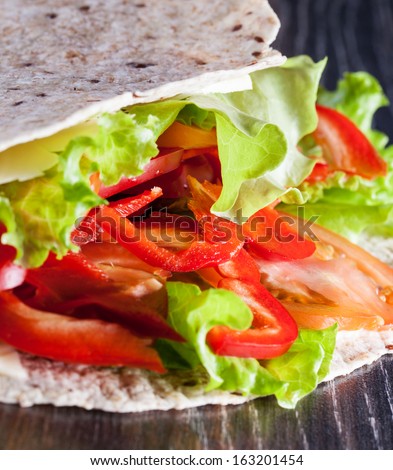 fresh vegetables in pita bread, close up