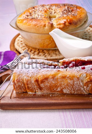 Roll cake with jam and cranberries