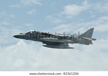 MALAGA (SPAIN) - 28 MAY: Celebration of Armed Forces Day at the beach of La Malagueta. Aircraft AV-8B Plus Harrier II making a stationary flight on the airshow on 28 May 2011 in Malaga, Spain