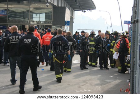 NEW YORK CITY - JAN 9: First responders at a ferry accident at Pier 11 in Lower Manhattan on January 9, 2013 in New York City, NY.