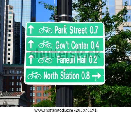 Sign in downtown Boston directing bicyclists to local landmarks.
