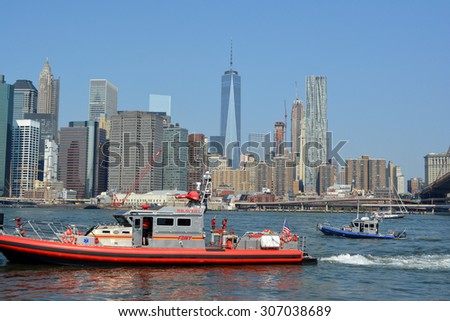 New York City, USA - August 16, 2015: FDNY and NYPD boats responding to an emergency on the East River in New York City.