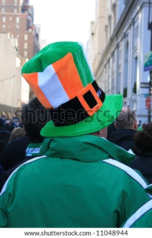 Man watching the St. Patrick's Day Parade In New York City.