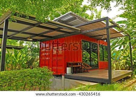 The container cabin in the garden. Container house.