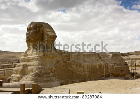 The Great Sphinx statue at Giza with white clouds behind