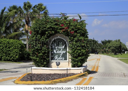 FORT LAUDERDALE, FLORIDA - OCTOBER 28: Coral Ridge Isles suburban neighborhood entry sign located on NE 15th Avenue north of Commercial Boulevard on October 28, 2012 in Fort Lauderdale, Florida.