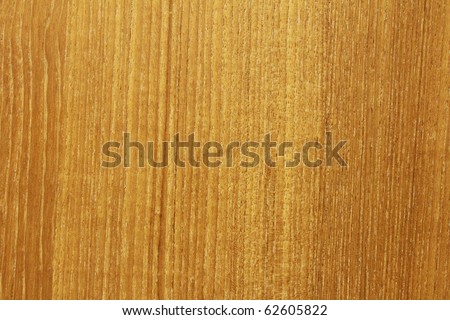Medium brown oak wood grain pattern background from a dining room table.