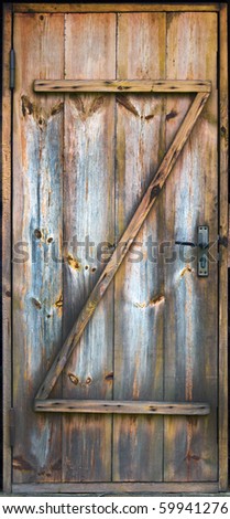 vintage boarded up funny wooden door with standart  door lock