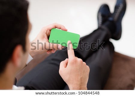 Business man using smart phone with green screen for internet and email. Sequence