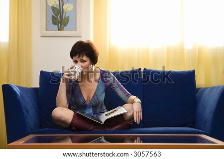 home life: girl relaxing on the coach at home
