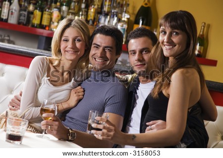 healthy living: friends at a restaurant having fun together