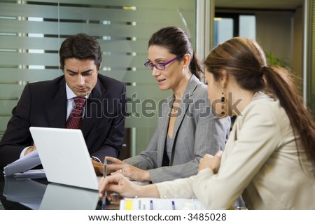 People at work: business team having a meeting