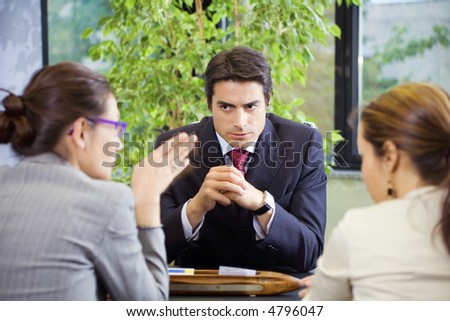 People at work: business team having a meeting