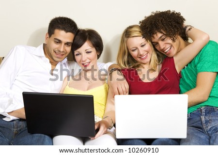 domestic life: two couples using laptops