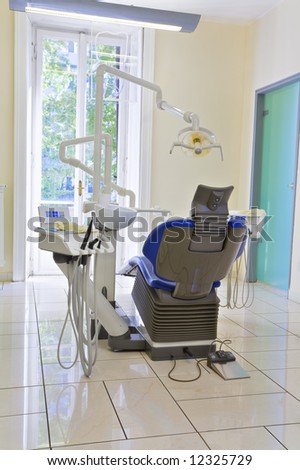 dentist\'s chair in examination room
