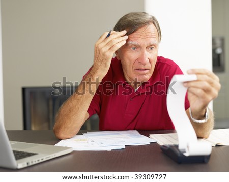 Senior man worried about his home finances. Copy space