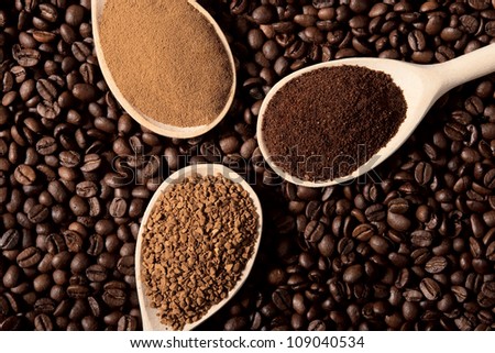 Three types of coffee on coffee beans